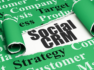 Image showing Marketing concept: black text Social CRM under the piece of  torn paper