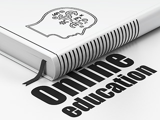 Image showing Learning concept: book Head With Finance Symbol, Online Education on white background