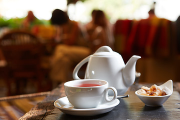 Image showing white teapot with tea Cup, saucer and teaspoon