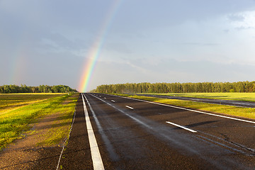 Image showing rainbow on the road