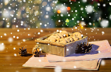 Image showing close up of christmas oat cookies on wooden table