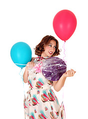 Image showing Woman with balloons and lollipop.