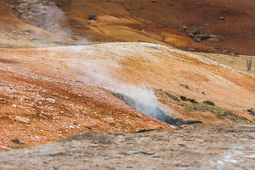 Image showing Steam rising from the ground