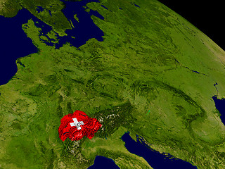 Image showing Switzerland with flag on Earth