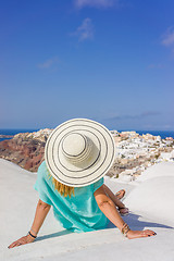Image showing Young woman on holidays, Santorini Oia town 