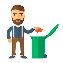 Image showing Man throwing paper in a garbage bin