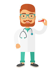 Image showing Pharmacist holding a medicine