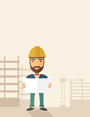 Image showing Construction worker holding the plan.