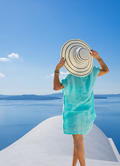 Image showing Young woman on holidays, Santorini Oia town 