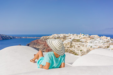 Image showing Young woman on holidays, Santorini Oia town 