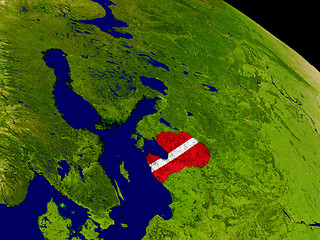 Image showing Latvia with flag on Earth