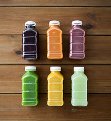 Image showing bottles with different fruit or vegetable juices