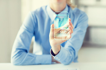 Image showing close up of woman with transparent smartphone