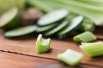 Image showing close up of celery stems and sliced cucumber