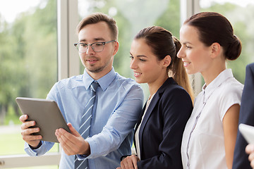 Image showing business people with tablet pc computer at office