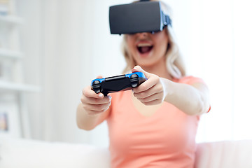 Image showing woman in virtual reality headset with controller