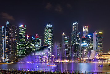 Image showing  Marina Bay Sands at night during Light and Water Show \'Wonder F