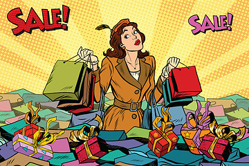 Image showing Woman with shopping in a sea of sales