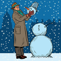 Image showing Retro man and snowman