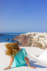 Image showing Young woman on holidays, Santorini Oia town 