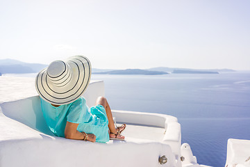 Image showing Young woman on holidays, Santorini Oia town 