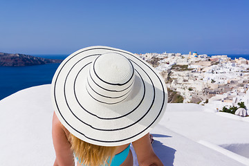 Image showing Young woman on holidays, Santorini Oia town 