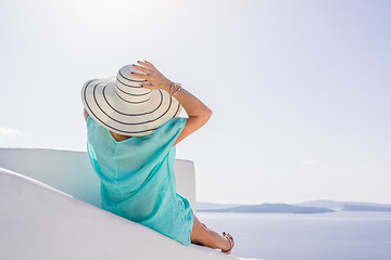 Image showing Young woman on holidays, Santorini Oia town 