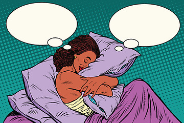 Image showing Young woman in bed hugging a pillow