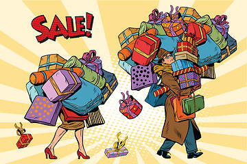 Image showing Holiday sales, a couple man and woman with shopping