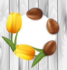 Image showing Greeting Card with Easter Chocolate Eggs and Yellow Tulips Flowe