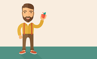 Image showing Happy man holding a red apple.