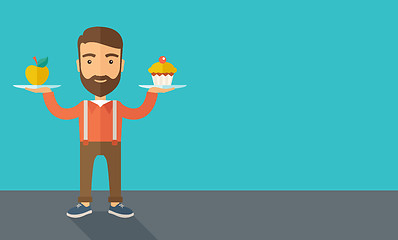 Image showing Man carries with his two hands cupcake and apple.