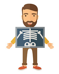 Image showing The view of man is holding a X-ray picture