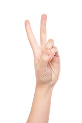 Image showing Hand forming victory sign isolated on white 