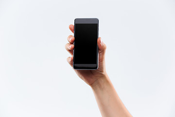 Image showing Human hand holding blank large mobile smart phone