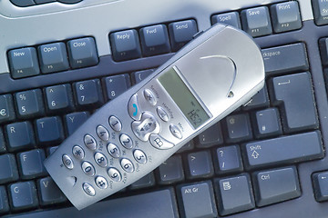 Image showing Cordless Phone on Keyboard