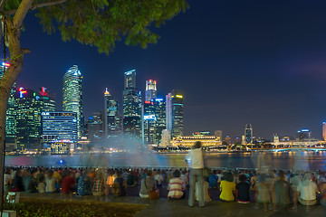 Image showing  Marina Bay Sands at night during Light and Water Show \'Wonder F