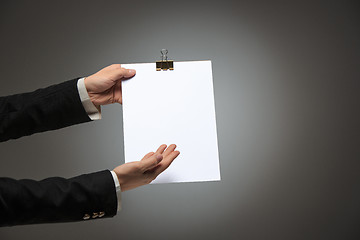 Image showing Male hands holding empty blank