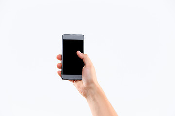 Image showing Human hand holding blank large mobile smart phone