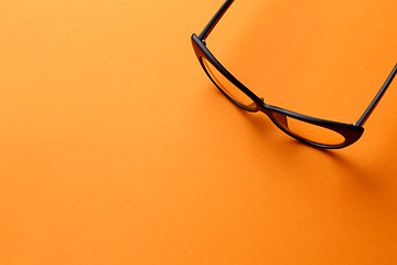 Image showing Glasses on blank orange background