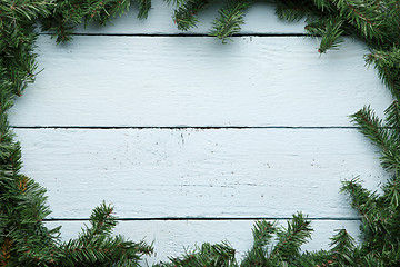 Image showing Christmas, new year wooden board with fir branches square frame