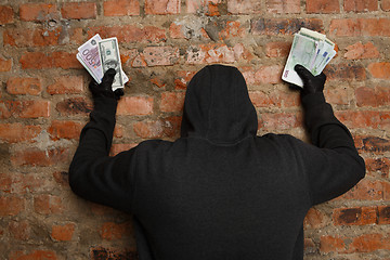 Image showing Cracker with money in hand