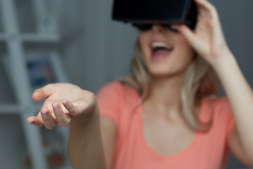 Image showing happy woman in virtual reality headset or glasses