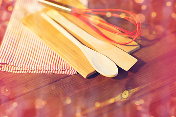 Image showing close up of cooking kitchenware on wooden board