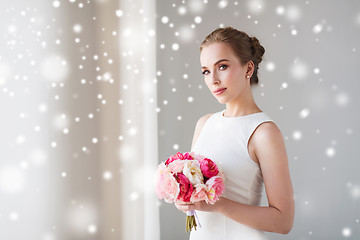 Image showing bride or woman in white dress with flower bunch