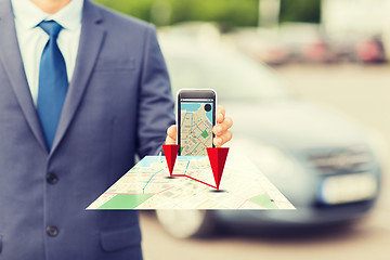 Image showing close up of business man with smartphone navigator