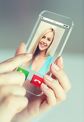 Image showing close up of woman with incoming call on smartphone