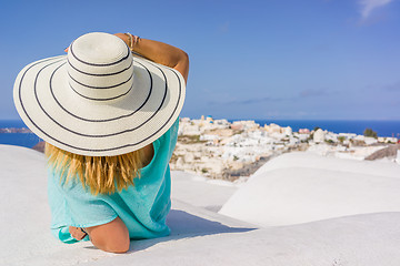 Image showing Young woman on holidays, Santorini Oia town 