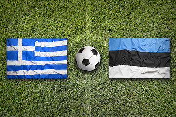 Image showing Greece vs. Estonia flags on soccer field