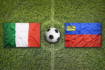 Image showing Italy vs. Liechtenstein flags on soccer field